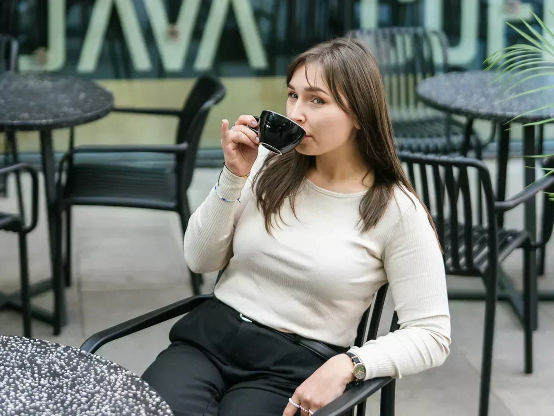 Cup of specialty decaf filter coffee from JAVA Coffee Roasters, styled in a lifestyle setting